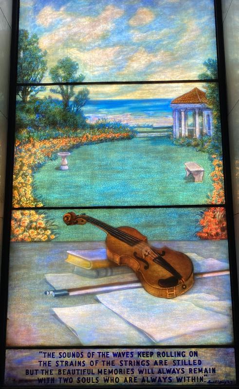 Dalmar Memorial Window:  garden with gazebo on a lake shore, with a violin