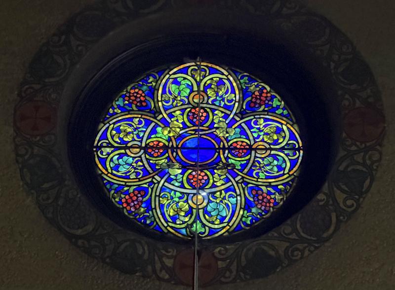 two small jeweled rose windows