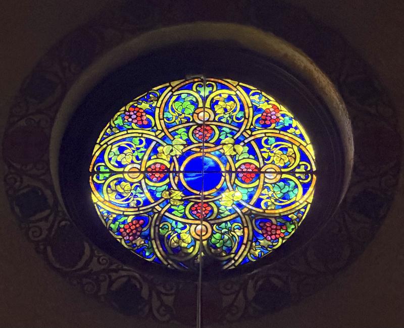 two small jeweled rose windows