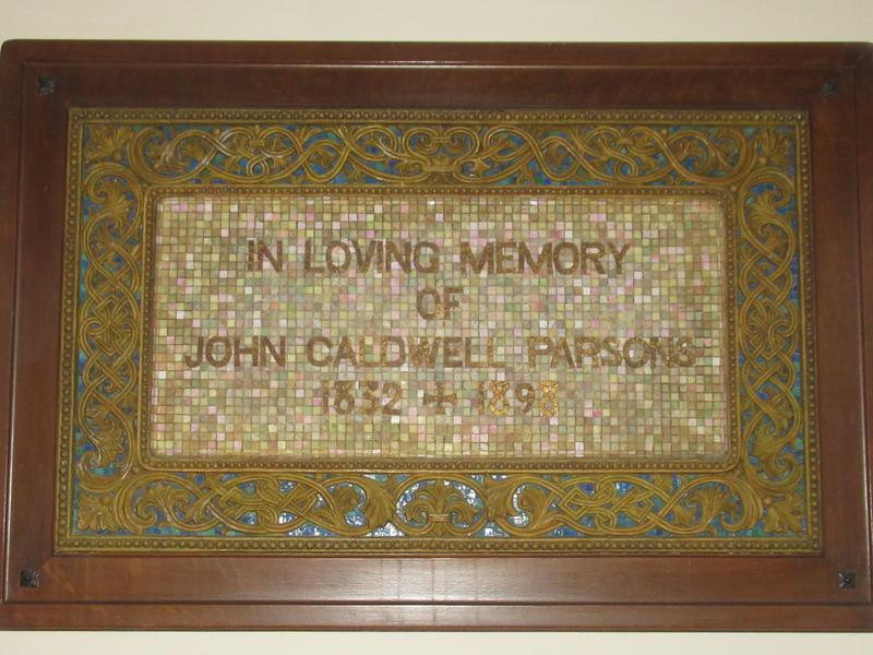 Parsons Memorial Tablet:  glass mounted on an old oak back and bordered with glass mosaic
