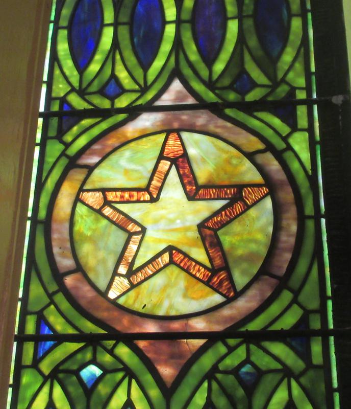 The Children's Offering Window:  ornamental with star
