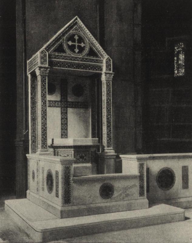 marble baptismal font inlaid with glass mosaic
