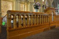 mosaic and tilework on pulpit, chancel rail and sedilia
