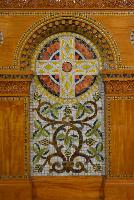mosaic and tilework on pulpit, chancel rail and sedilia