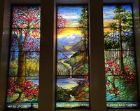 Illinois, Chicago, Rosehill Cemetery, Community Mausoleum: Murphy Memorial Window:  landscape with trees at left, conifers at right, mountains and water
