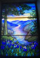 Illinois, Chicago, Rosehill Cemetery, Community Mausoleum: Douglas Memorial Window:  landscape with confiers at left and right, mountains, water and irises