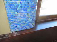 mosaic decoration on door and window frames