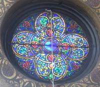 two small jeweled rose windows